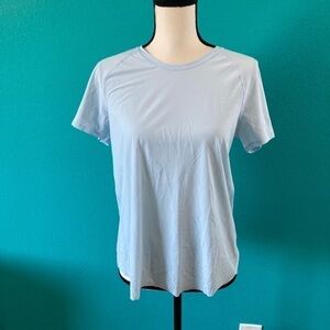 Lululemon quick pace short sleeve open back light blue top